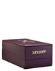 A purple box adorned with gold lettering showcasing the "Xerjoff" brand, featuring a logo on the top and subtly alluding to the exquisite Uden Overdose fougere fragrance within.